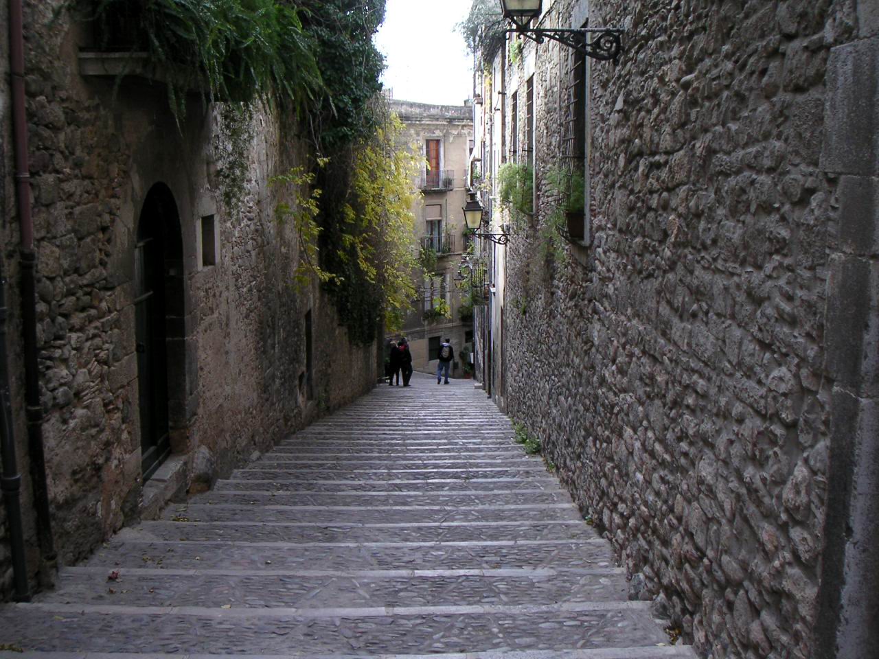 Narrow stone street in Girona's former Jewish Quarter