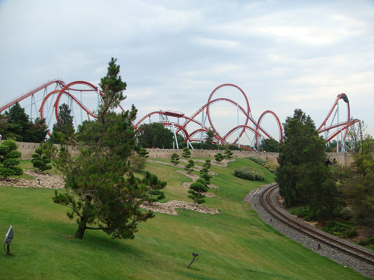 View of the red track of the Dragon Khan roller coaster